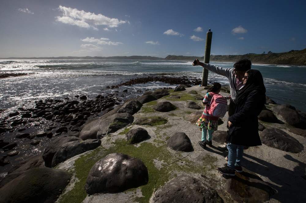 The new New Zealanders check out the Raglan coast. The new New Zealanders check out the Raglan coast.