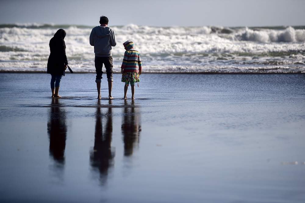 A first dabble in the sea for Attia. A first dabble in the sea for Attia.