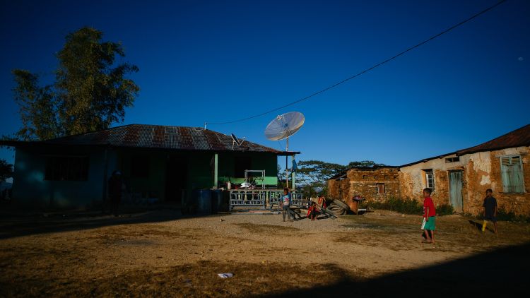 Letefoho village kids playing ‘balla’ (football) outside their home in the early morning