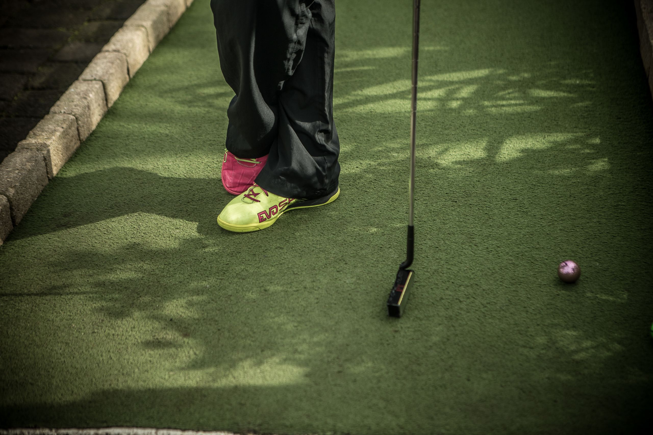 NZ minigolf international Bobby Hart's asymmetric shoes. JASON DORDAY/STUFF