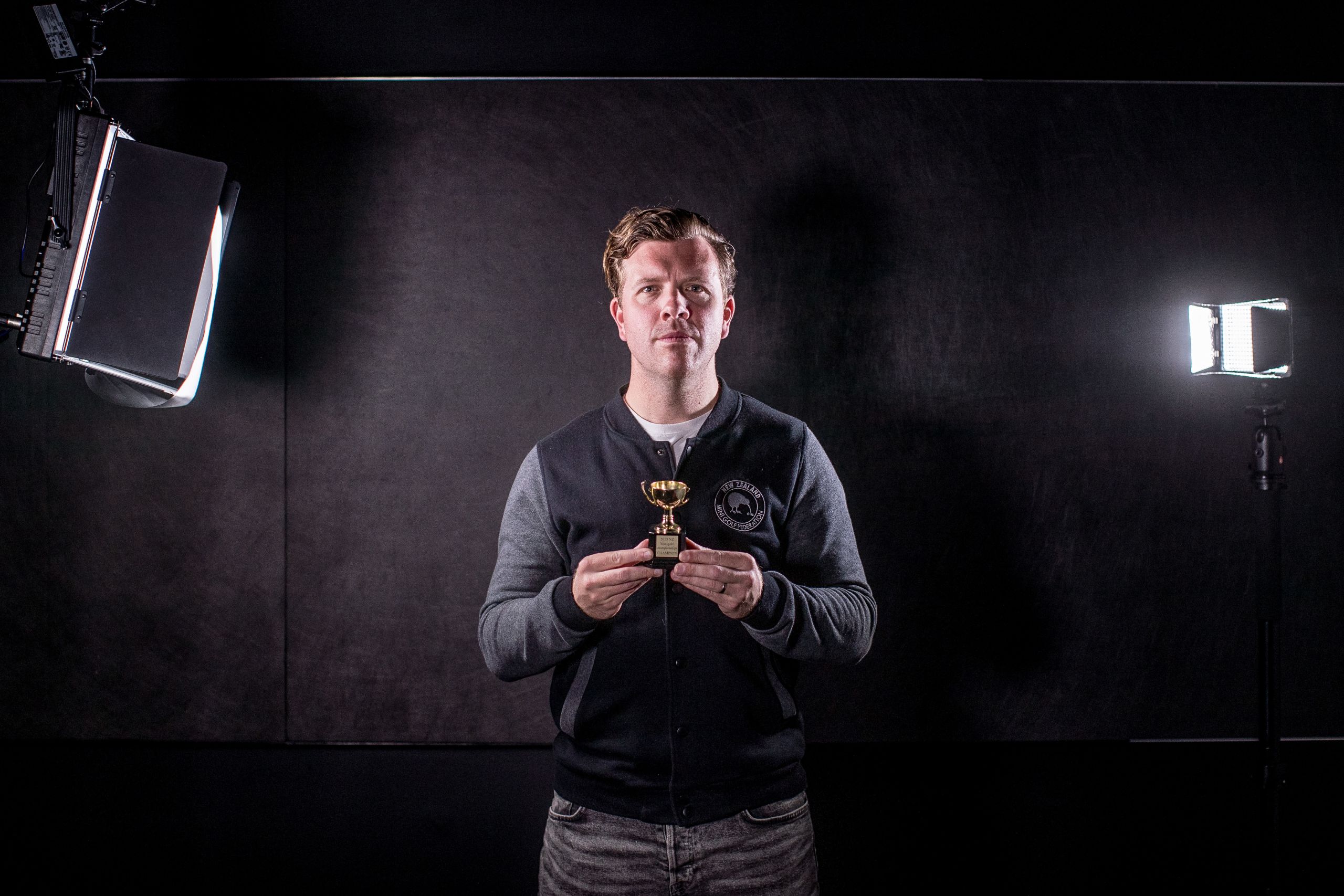 Ollie Hicks, founder and first president of the NZ Mini Golf Federation, with his 2015 national champions' trophy. JASON DORDAY/STUFF
