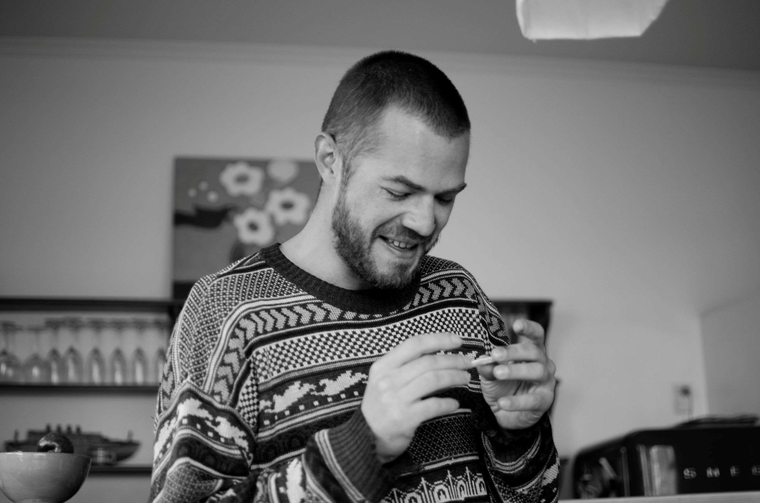 Kyrill Masheka rolls a cigarette in Nelson.