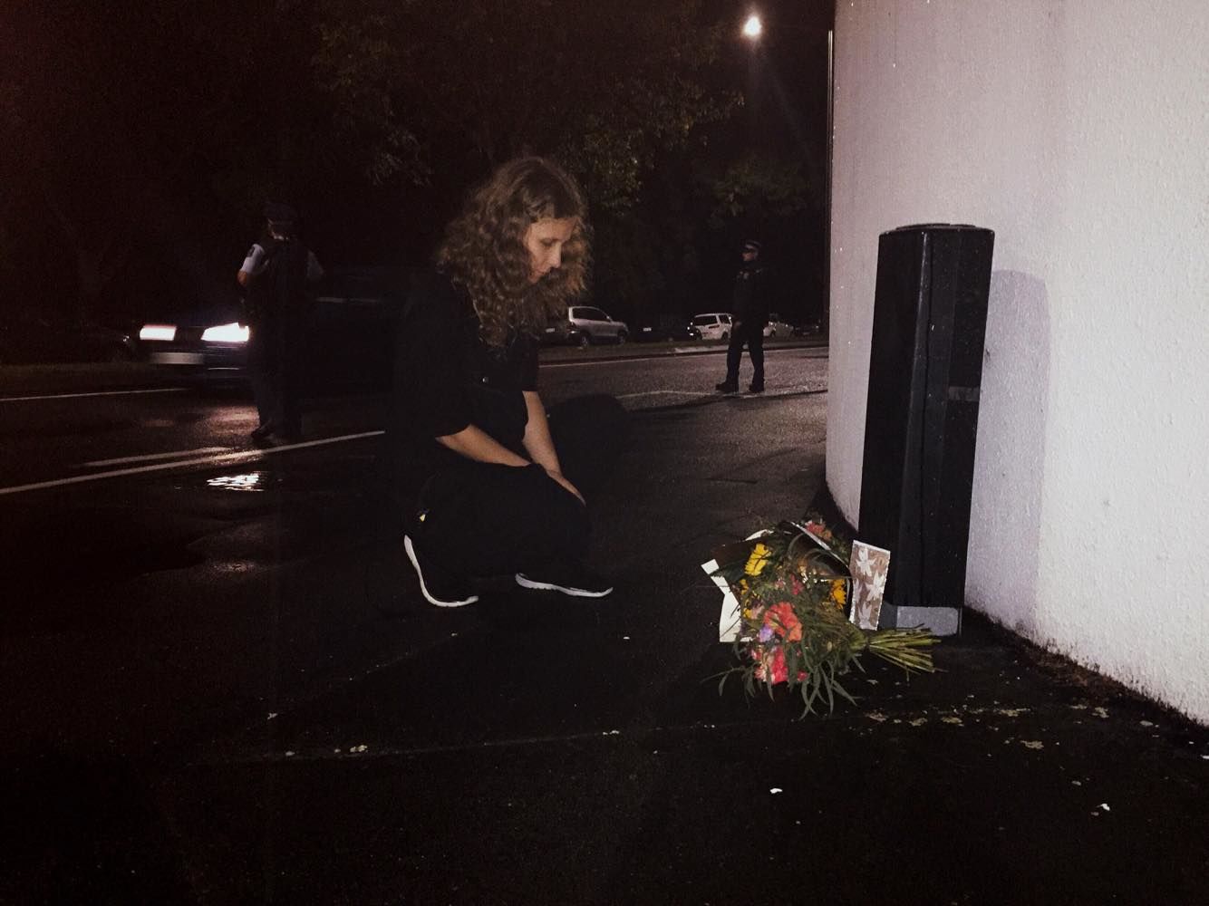 Masha Alyokhina with flowers near Al-Noor Masjid in Christchurch, on the night of the 15th. 