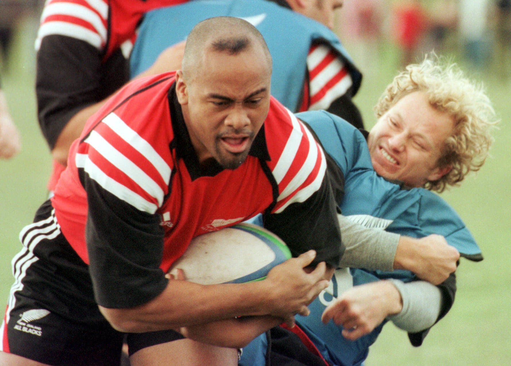 July 1999 Jonah Lomu and Tony Brown get into it at Cromwell at the last open All Black training session before the springboks rugby test in Dunedin. Credit: Barry Harcourt / Stuff