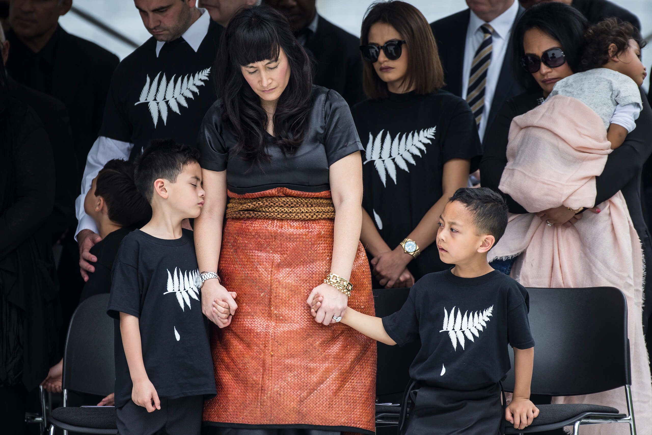Wife Nadene Quirk and children Braylee and Dhyreille during the Jonah Lomu memorial service at Eden Park. Credit: Peter Meecham / Stuff