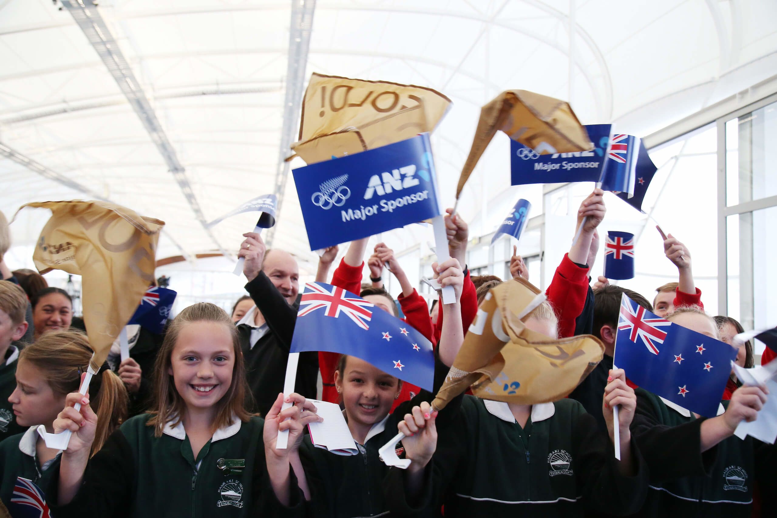 School, children arrive early at The Cloud on Auckland's waterfront, to welcome home the Olympic team. Credit: David White / Stuff
