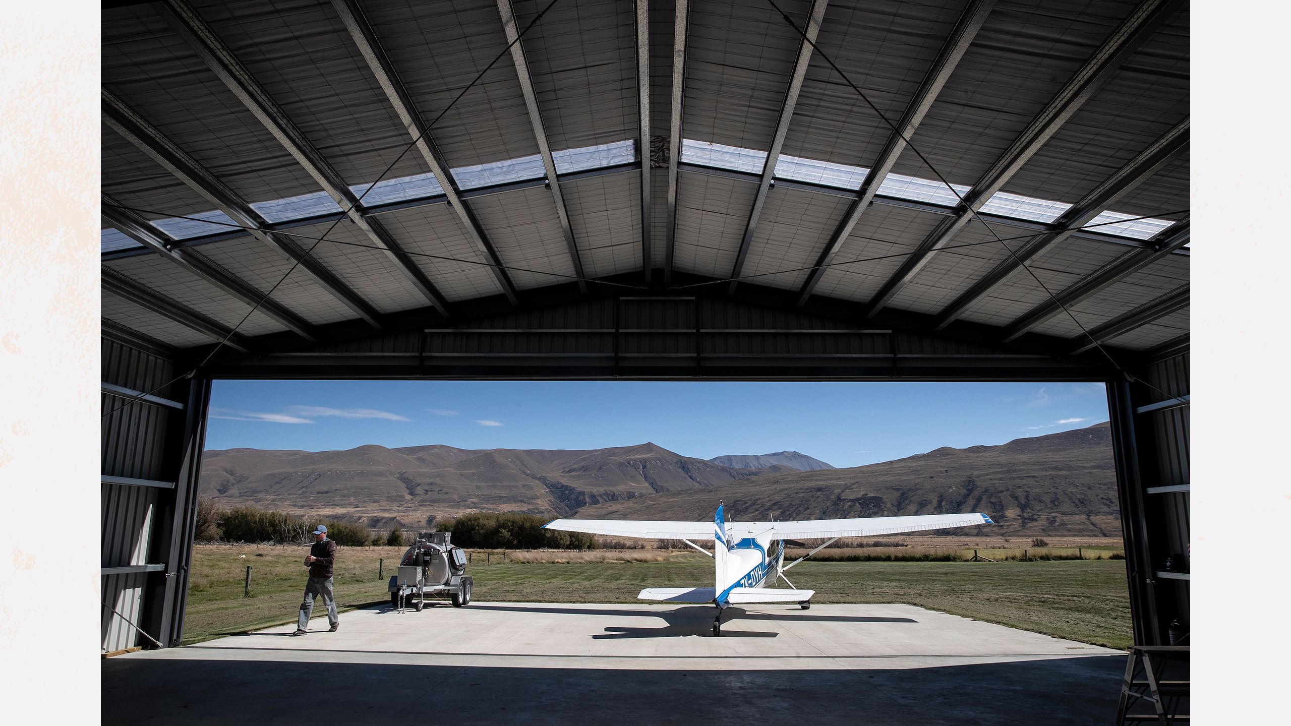 Philip Todhunter readies his plane for flight over the farm.