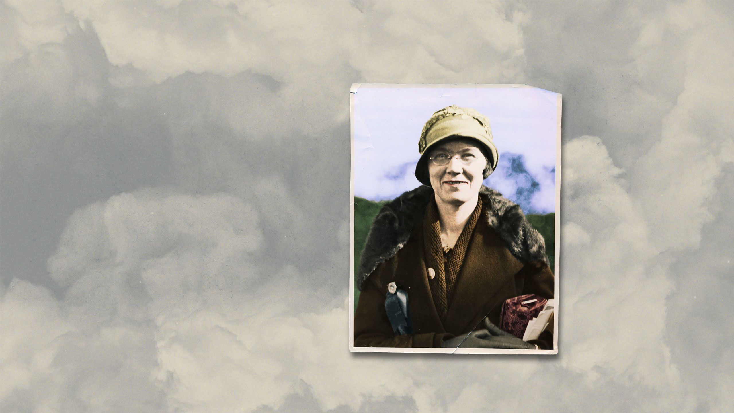 Old sepia toned portrait photo of Mrs Muir coloured like it has been hand painted with ink.