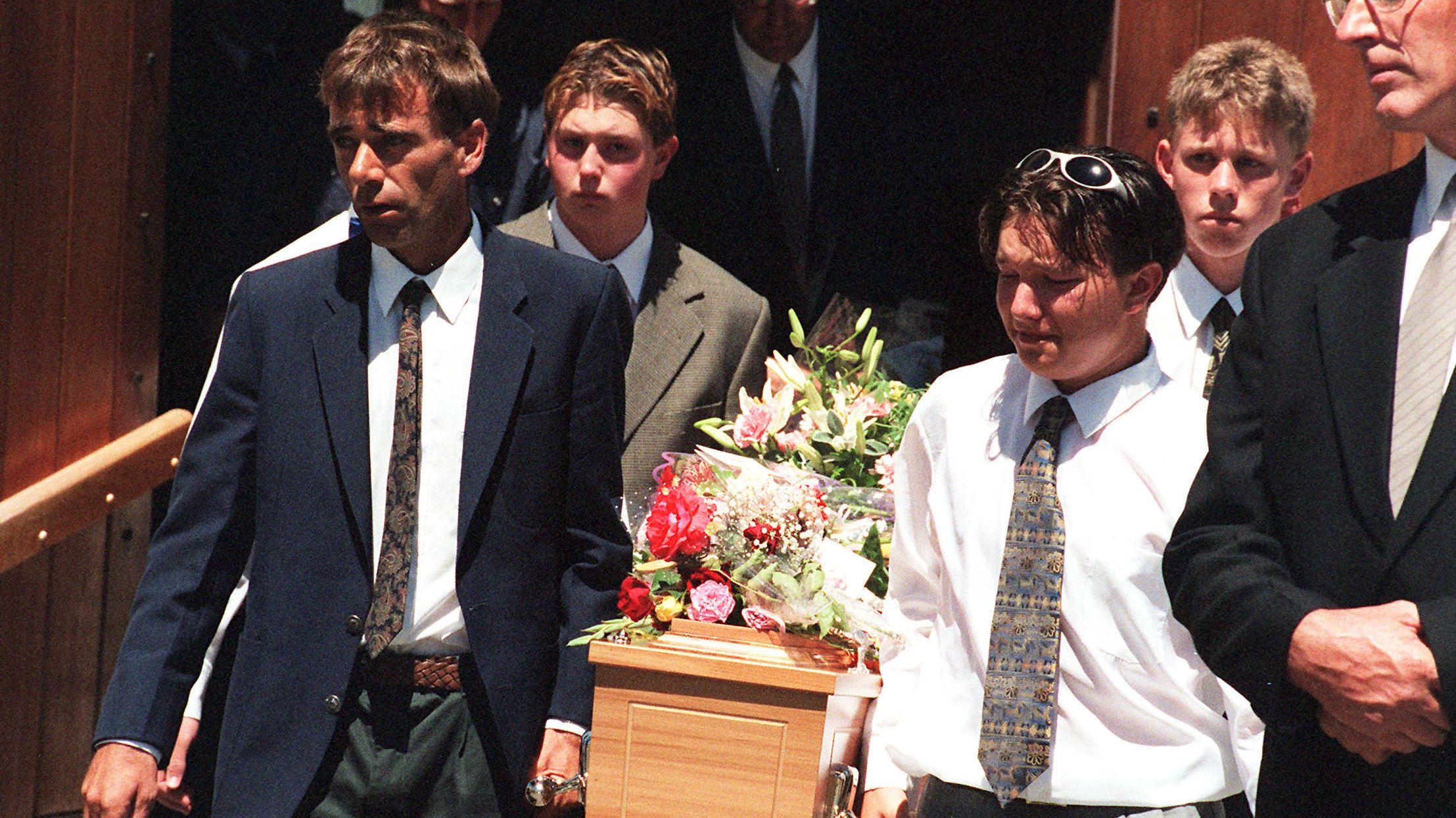 Pallbearers carry Kirsty's casket