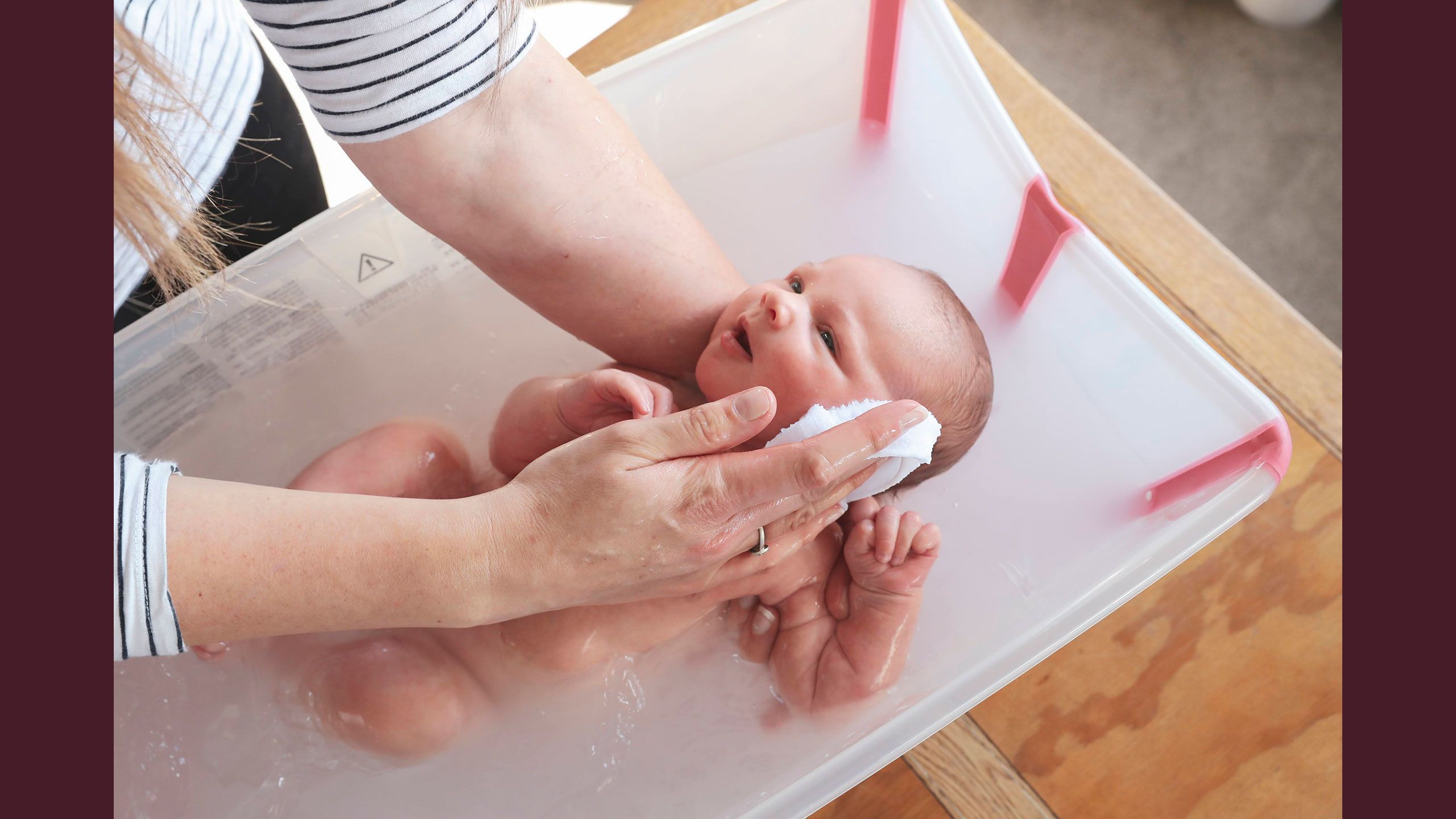 A close-up of Jessica gently washing Hazel.