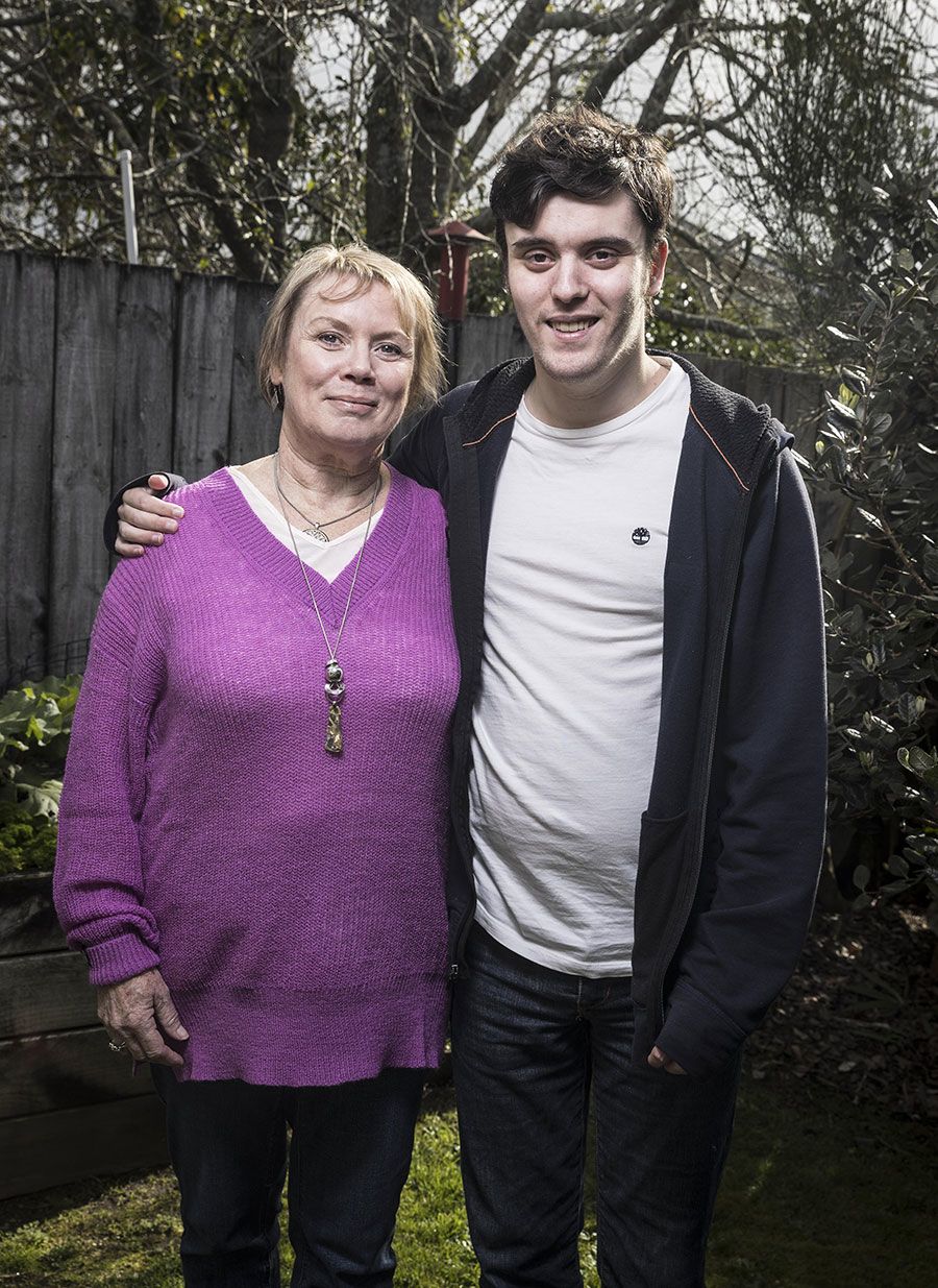 Saul and Yvonne standing next to each other in their back garden.