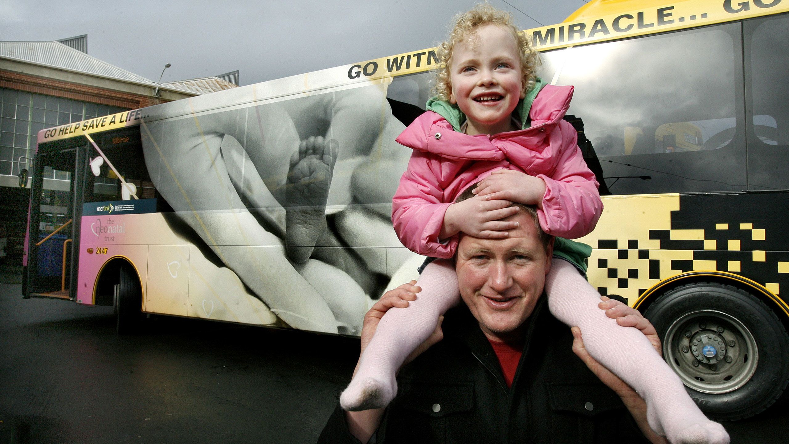John Dickson with a young Charlotte sitting on his shoulders.