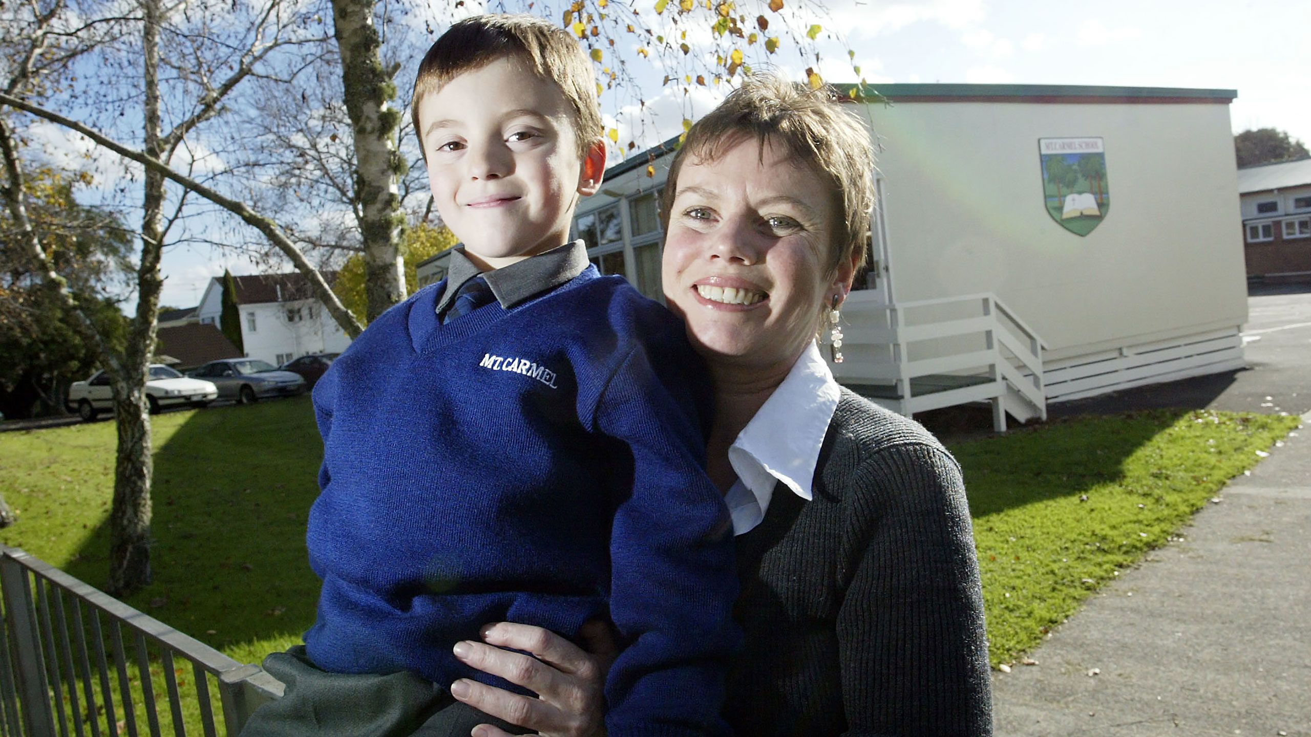 Yvonne Gallagher picks up her son, Saul after his first day of school.