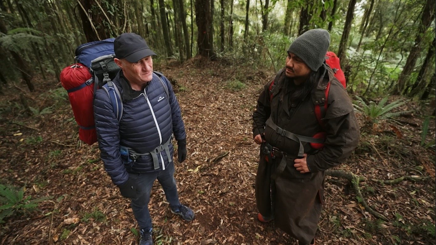 two people hugging infront of a police station