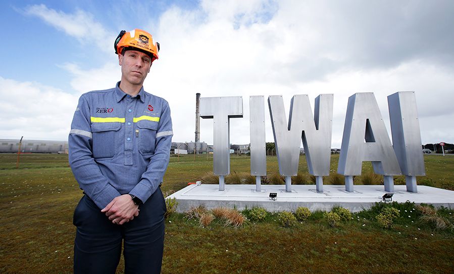 Stew Hamilton by the Tiwai sign